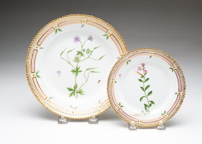 TWO ROYAL COPENHAGEN "FLORA DANICA" PORCELAIN BREAD AND BUTTER PLATES.