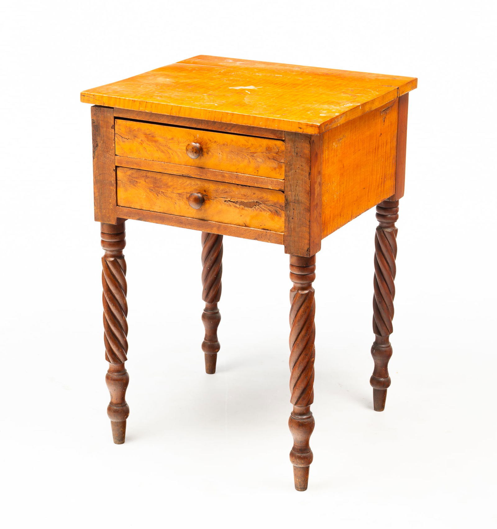 AMERICAN SHERATON TIGER MAPLE AND FLAME MAHOGANY TWO-DRAWER STAND.: Mid-19th Century. Poplar secondary. Having a rectangular top above a stack of two drawers and rising on rope-twist legs ending in turned and tapered feet. 28.75"h. 19.75"w. 18.75"d.