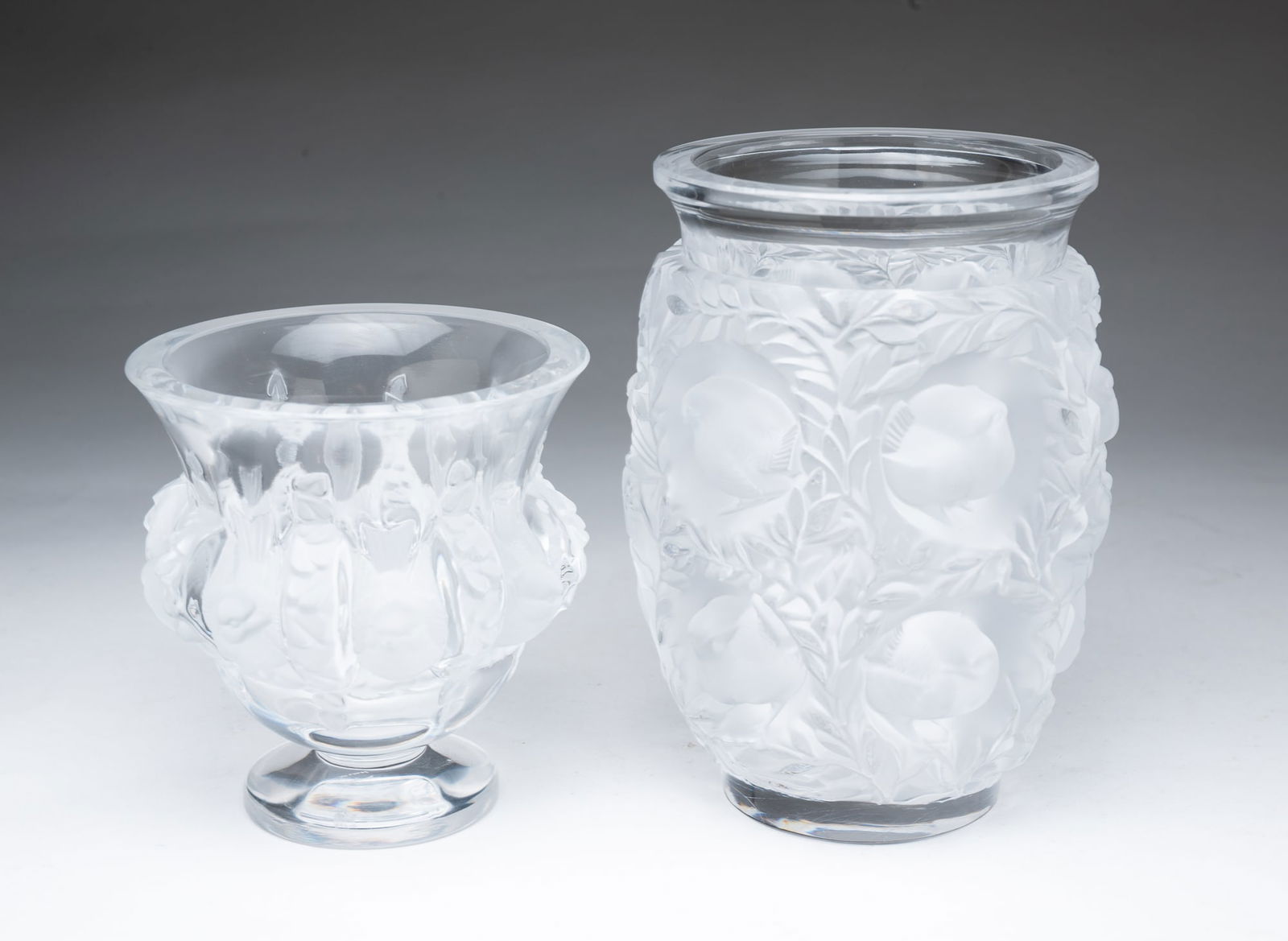 TWO LALIQUE CRYSTAL VASES WITH BIRD MOTIFS. (1 of 5)