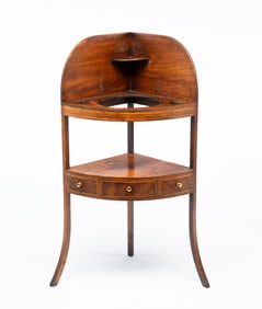 GEORGE III MAHOGANY AND STRING-INLAID TWO-TIER CORNER WASHSTAND.