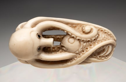 JAPANESE CARVED OKIMONO FIGURE.