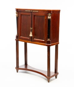 EMPIRE STYLE MAHOGANY CABINET-ON-STAND.