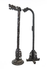 TWO CHINESE CARVED TEAK FLOOR LAMP STANDARDS.