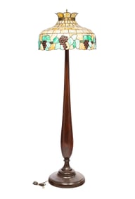 AMERICAN FLOOR LAMP WITH LEADED AND COLORED GLASS SHADE.