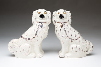 PAIR OF STAFFORDSHIRE PORCELAIN SPANIELS.