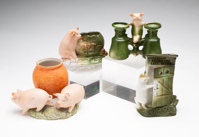 FOUR GERMAN NOVELTY PORCELAIN PIG ITEMS.