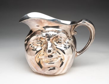 AMERICAN REED AND BARTON "SUNNY JIM" SILVER PLATED PITCHER.