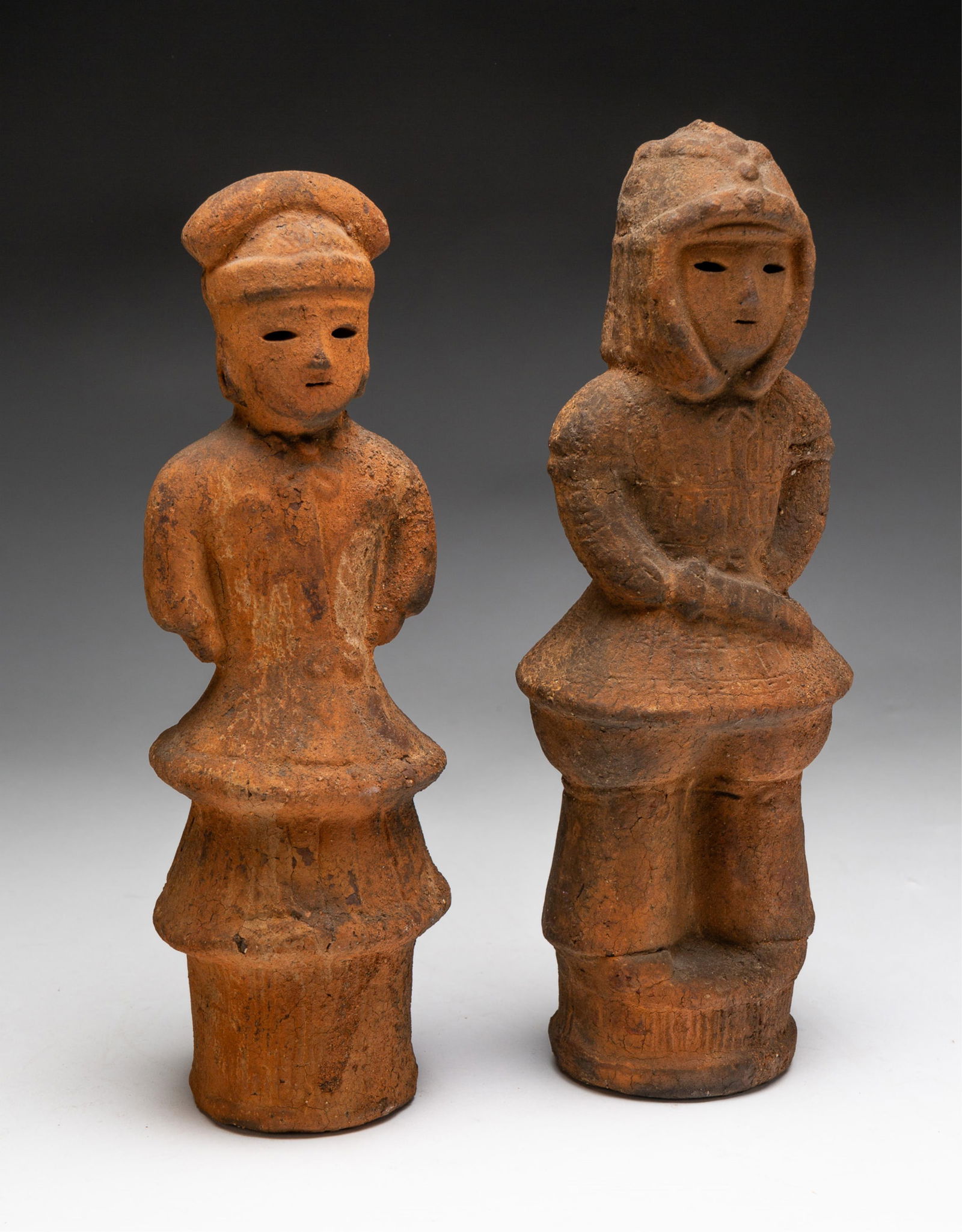 TWO JAPANESE EARTHENWARE HANIWA FIGURES. (1 of 3)