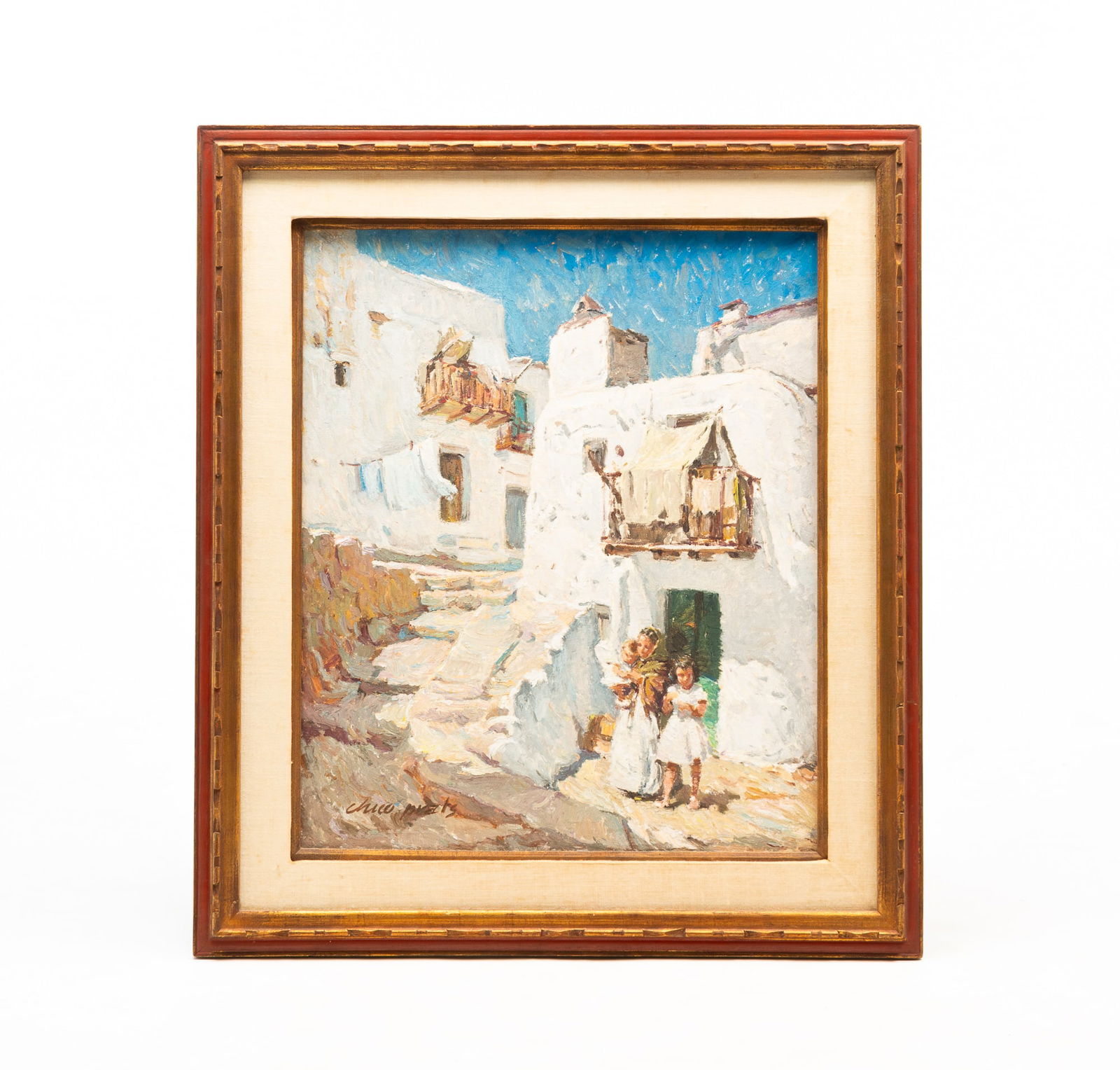 JOSI MANUEL CHICO PRATS (SPANISH, 1916-2006) OIL ON CANVAS OF VILLAGE.: 20th Century. White stucco buildings with balconies in a hilly village, mother and children in foreground. Signed lower left. 24"h. 20"w. Framed, 31.5"h. 27.5"w.