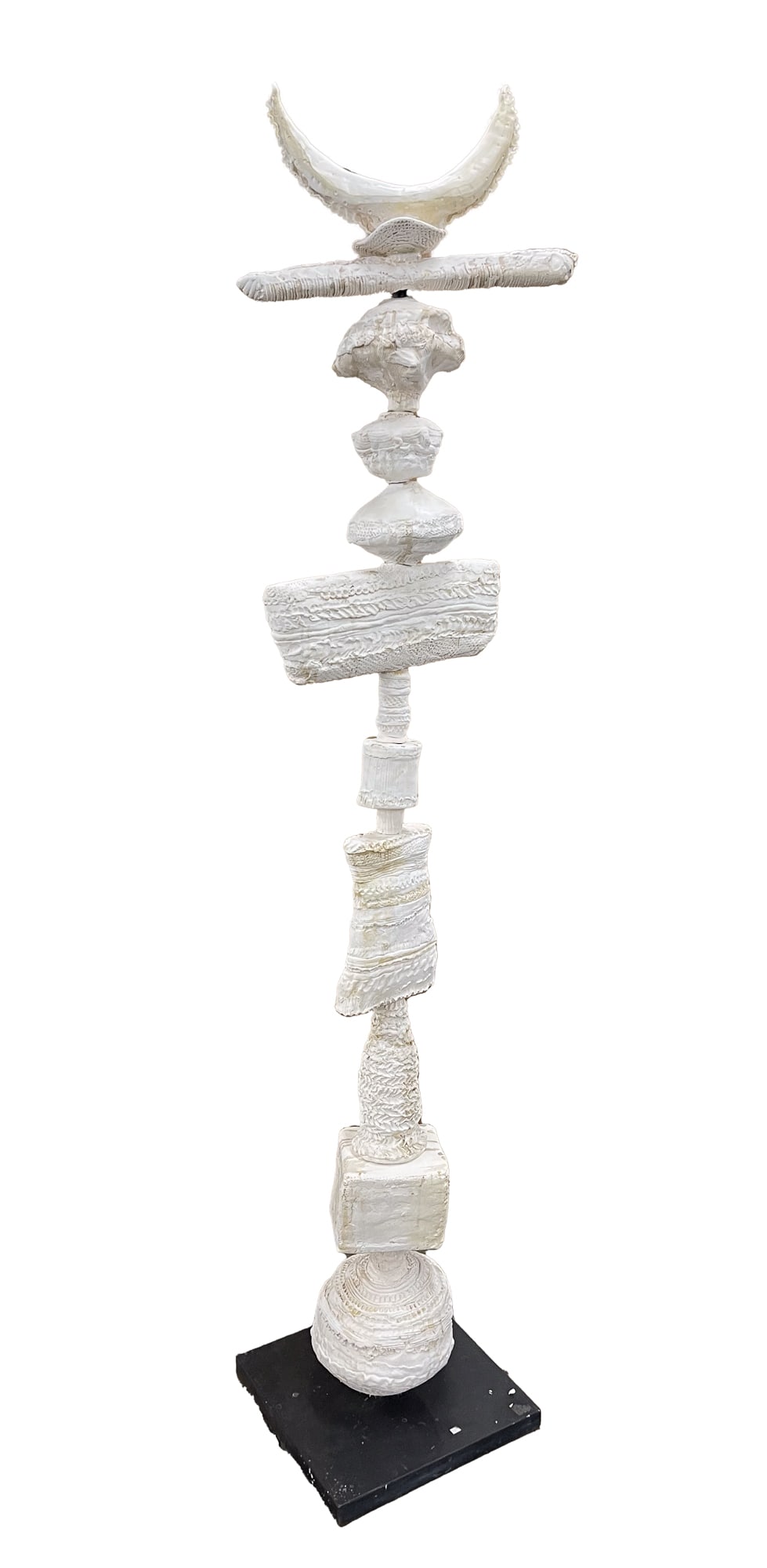 JULIE SILVERS (NEW ORLEANS, LOUISIANA) MIXED MEDIA TOTEM SCULPTURE.: Julie Silver (New Orleans, Louisiana), Contemporary. Mixed media. Totem in white comprised of twelve handmade objects on an iron stand. 86"h. 16" square at base.