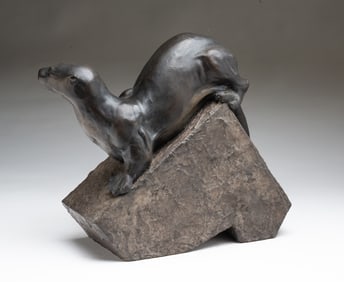 WILLIAM H. TURNER (AMERICAN, 20TH CENTURY) CAST BRONZE SCULPTURE OF AN OTTER.