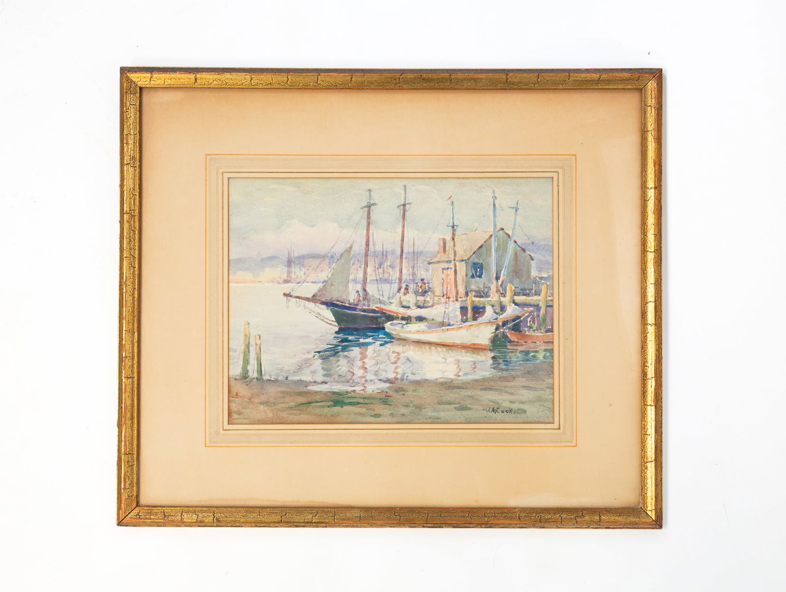JOHN ALFRED COOK (MASSACHUSETTS, 1871-1936) WATERCOLOR OF GLOUCESTER HARBOR.: American, ca. 1900. On paper. Coastal fishing boats against a pier with other side of harbor in background. Matted and framed, 16.5"h. 19.5"w.