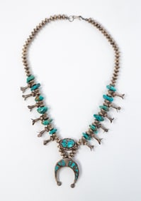 NATIVE AMERICAN TURQUOISE SQUASH BLOSSOM NECKLACE.