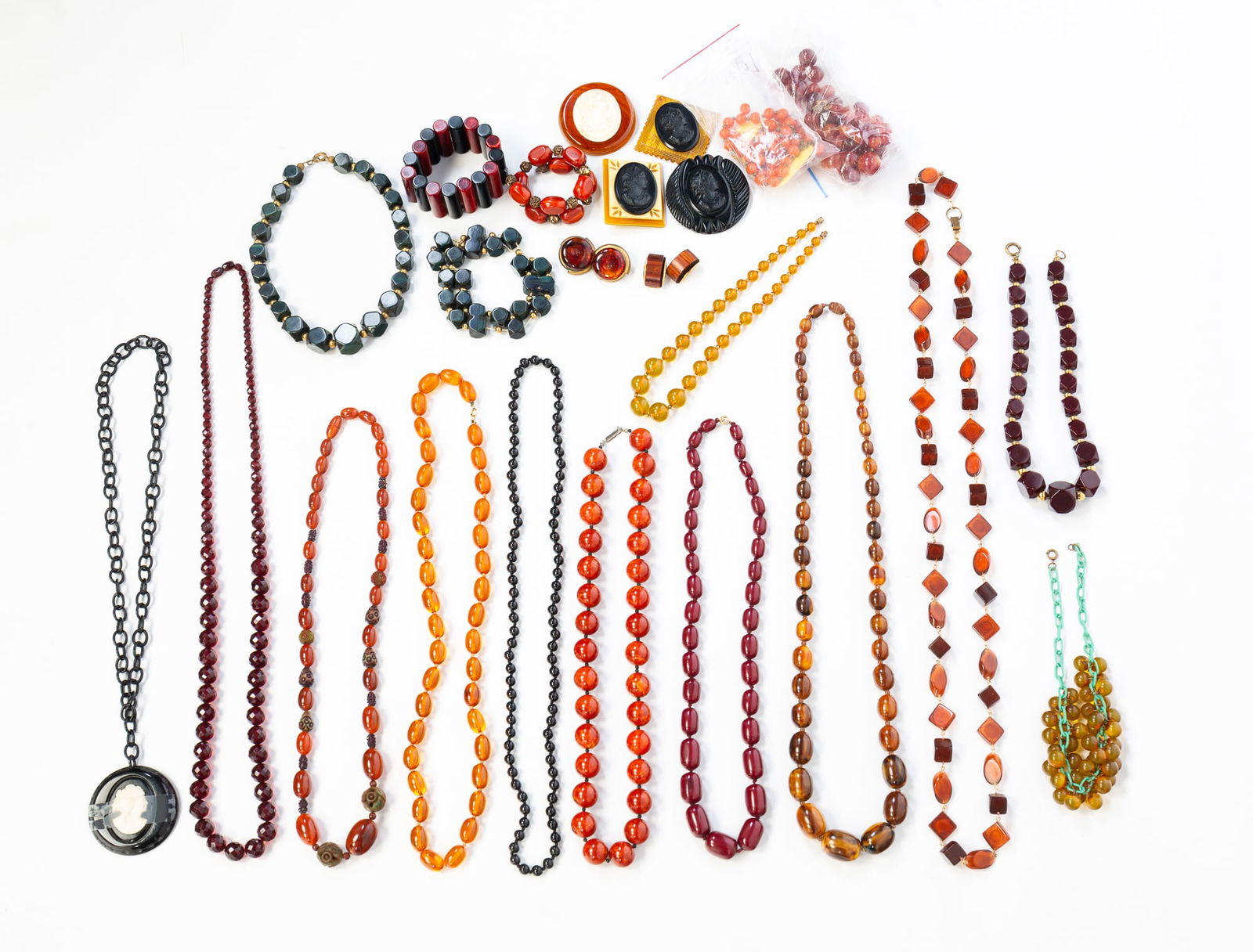 MID-CENTURY STRANDS OF BEADS INCLUDING BAKELITE. (1 of 6)