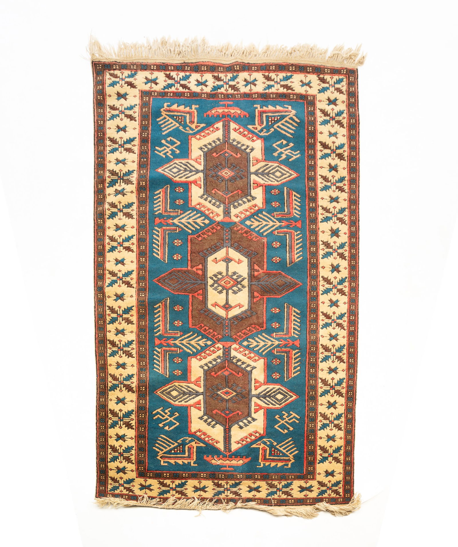 CAUCASIAN AREA RUG.: Late 20th Century. Wool. Three medallions, sky blue field, beige and tan borders with multi-colored geometric pattern. 3'8"w. 6'l.