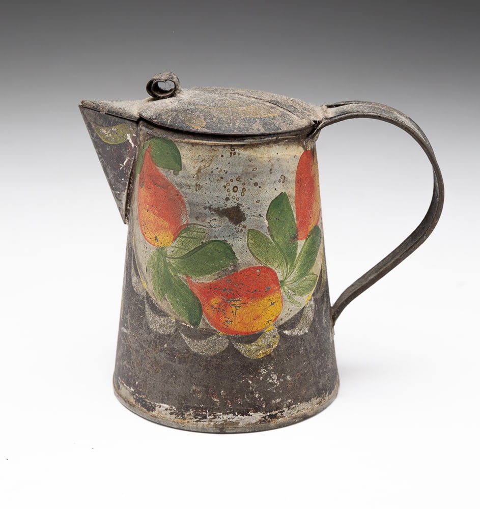 AMERICAN TOLE-PAINTED SYRUP PITCHER.: First half 19th Century. Conical form with triangular spout, hinged lid with thumb tab, and strap handle. With painted decoration. 4"h.