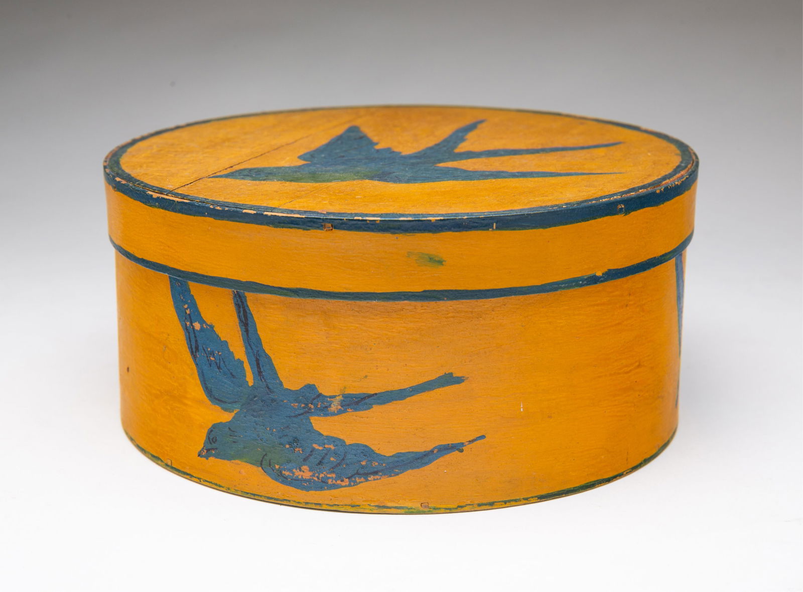 AMERICAN FOLK ART MUSTARD-PAINTED BENTWOOD PANTRY BOX WITH BLUE SWALLOWS. (1 of 4)