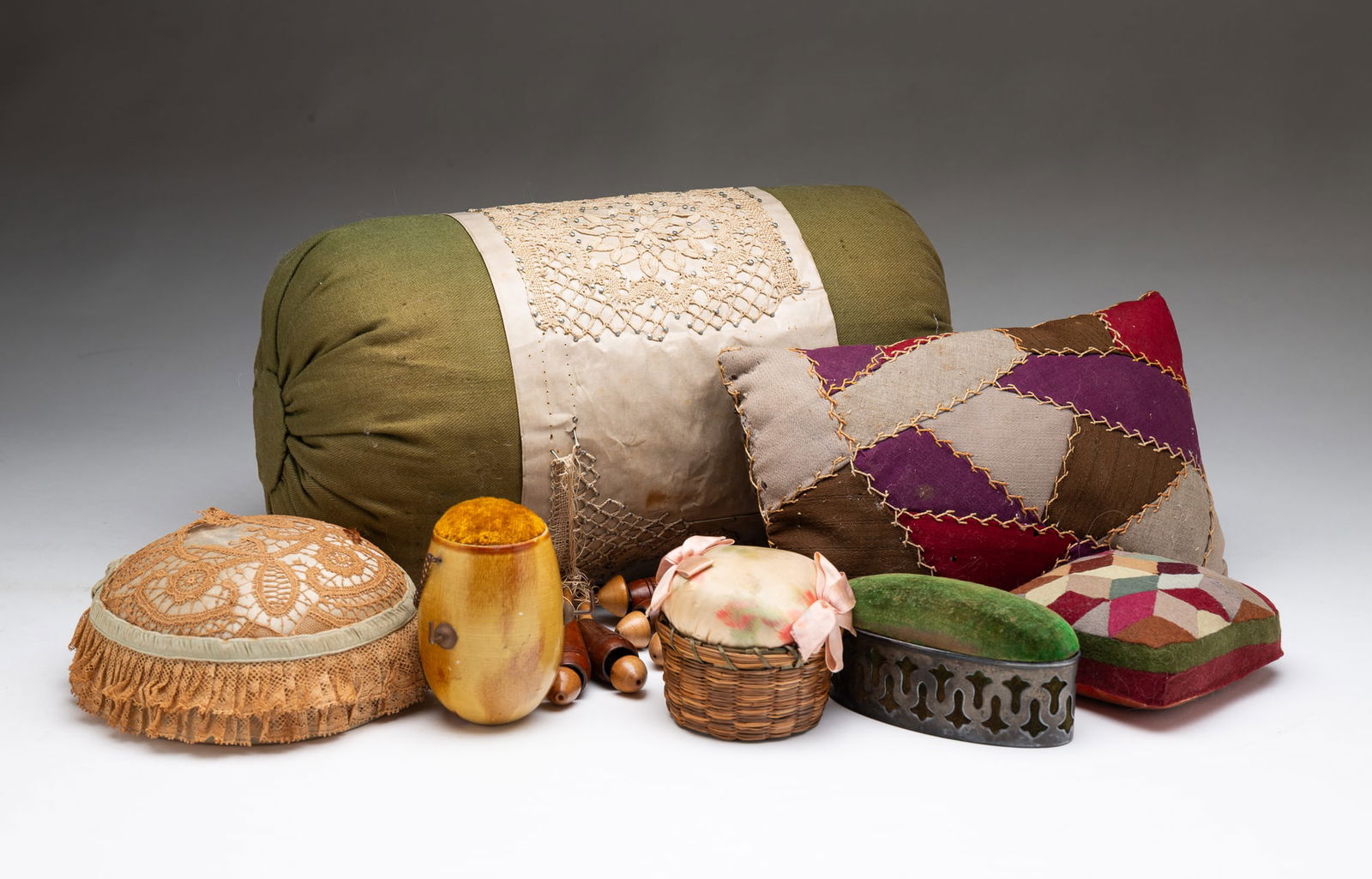 GROUP OF SEVEN PIN CUSHIONS AND PILLOWS. (1 of 6)