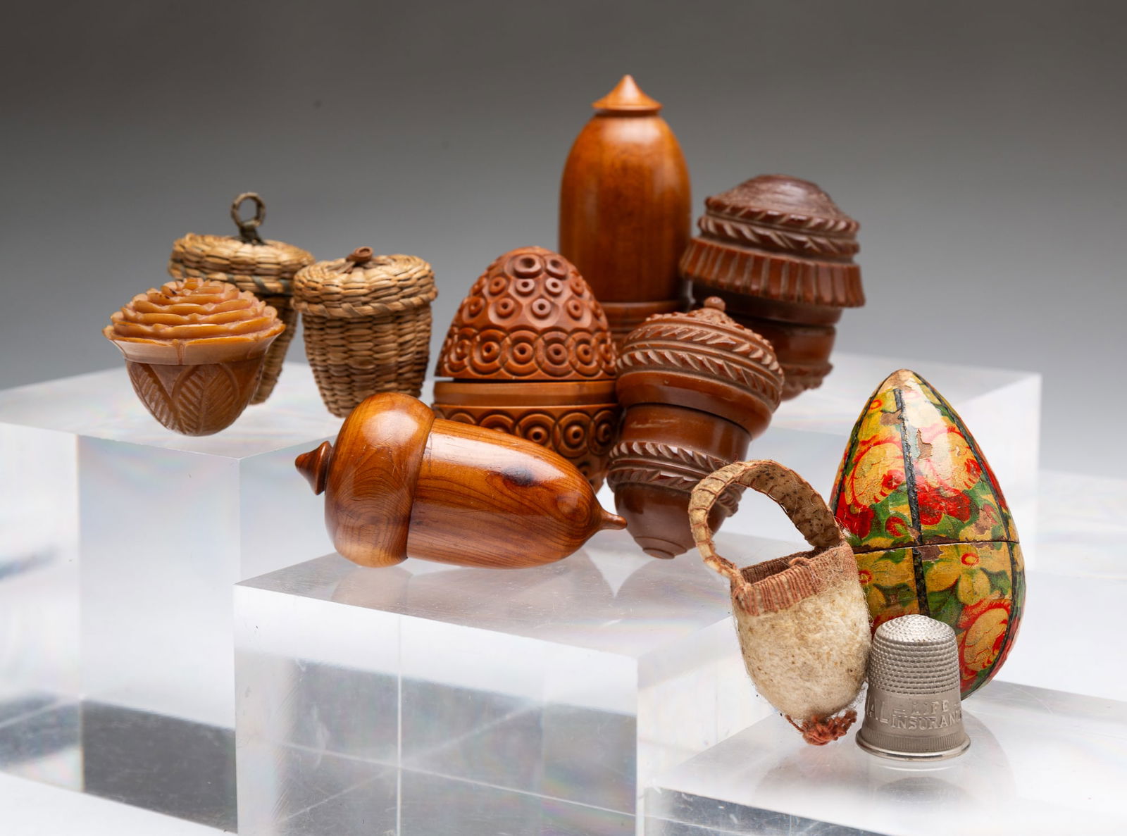 COLLECTION OF TWELVE THIMBLE HOLDERS. (1 of 5)