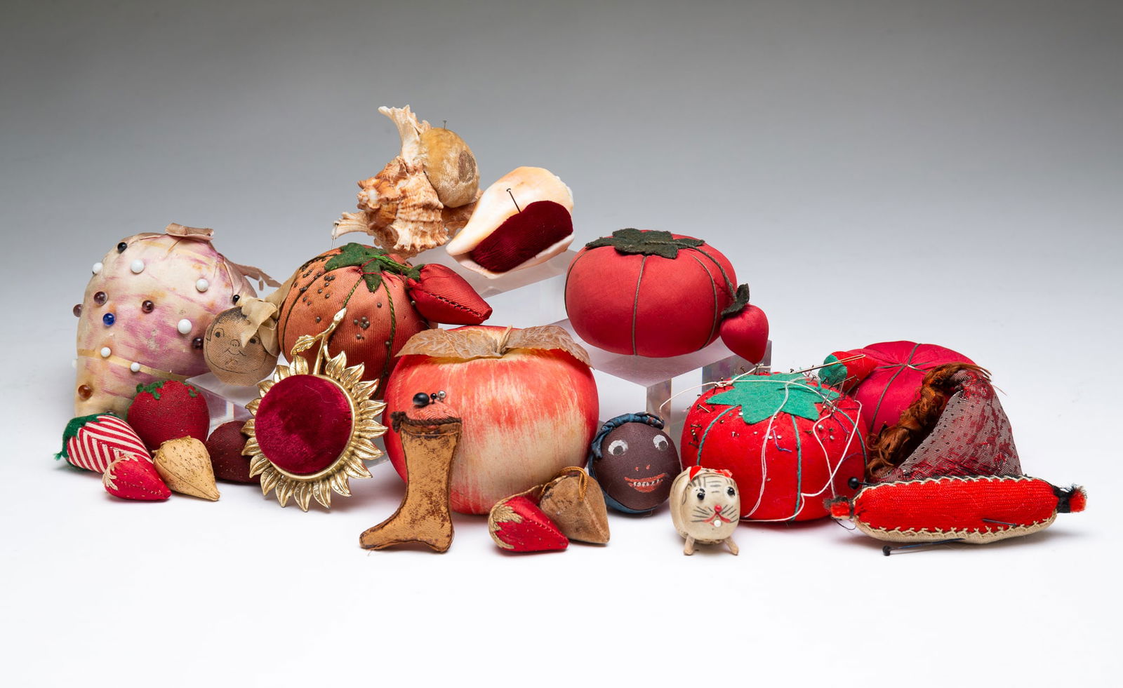 COLLECTION OF TWENTY-TWO PINCUSHIONS AND EMERIES. (1 of 4)