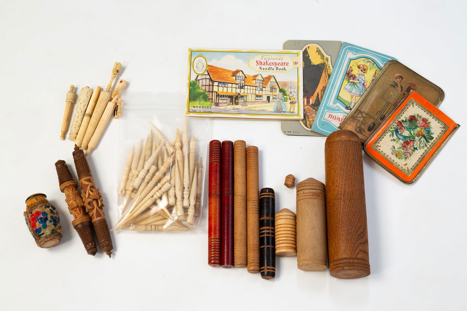 COLLECTION OF NEEDLE CASES, THREAD CASES, AND SEWING AWLS. (1 of 5)