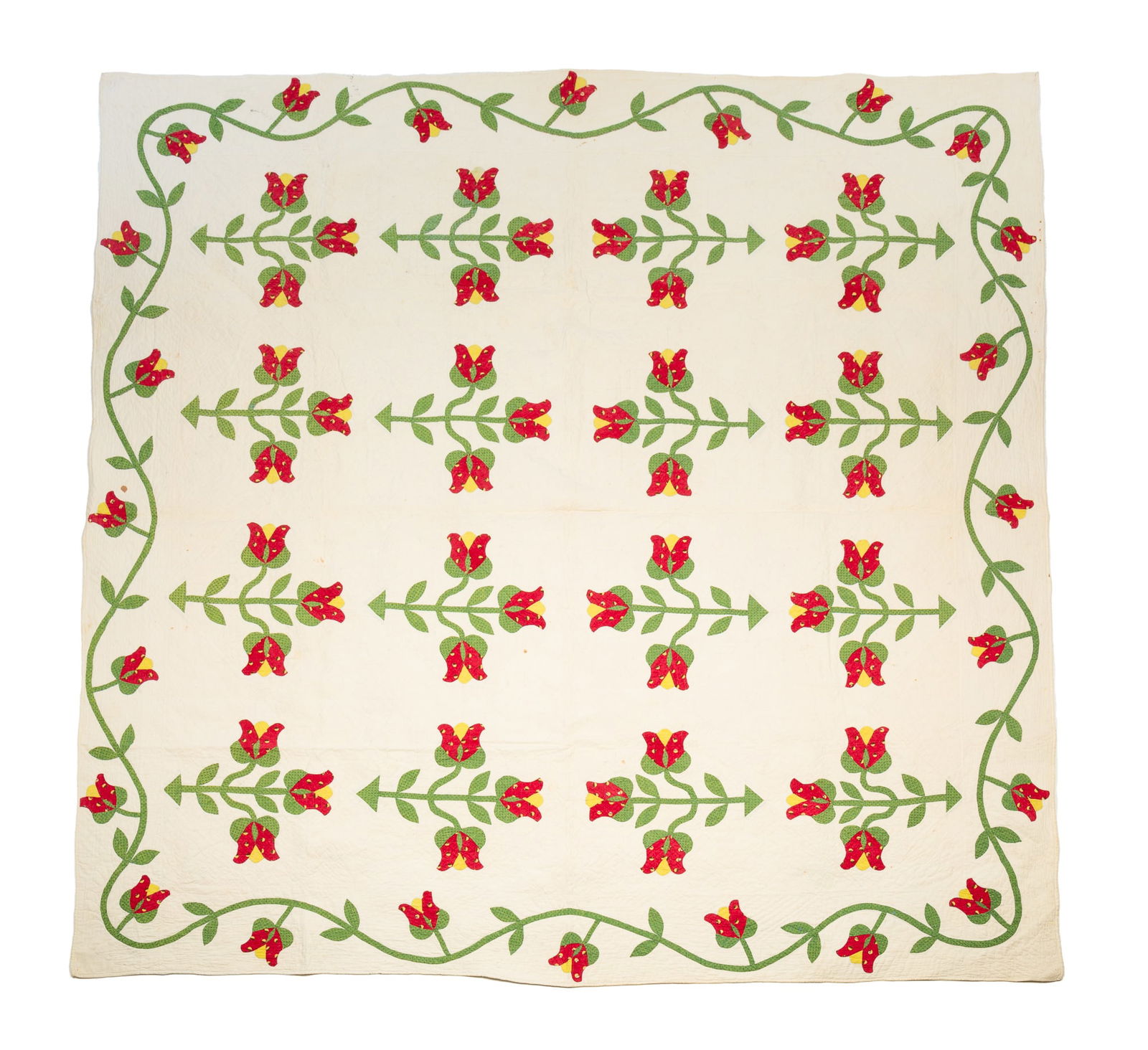 AMERICAN APPLIQUE TUILP QUILT.: Early 20th Century. Hand-stitched. White ground with green, yellow, and red tulips, comprised of patterned and solid fabrics.Provenance: From the Lifetime Quilt and Textile Collection of Louise A. Ven