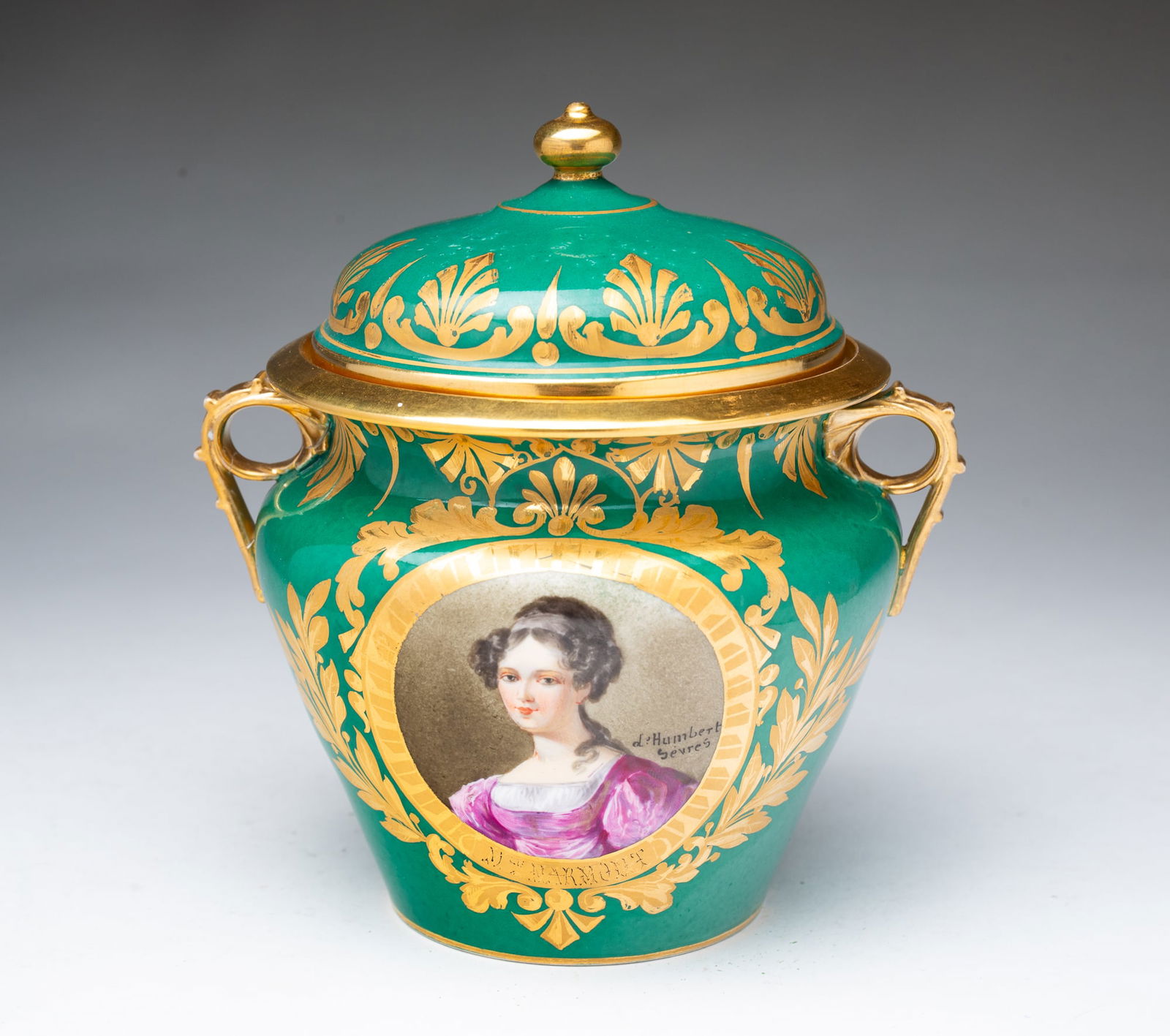 JULES-EUGENE HUMBERT (1821-1870) FOR SEVRES LIDDED JAR WITH PORTRAIT.: French, Mid-19th Century, Green glaze with heavy gold decoration. Female portrait sitter identified as Madame M. Marmont. 5.5"h.