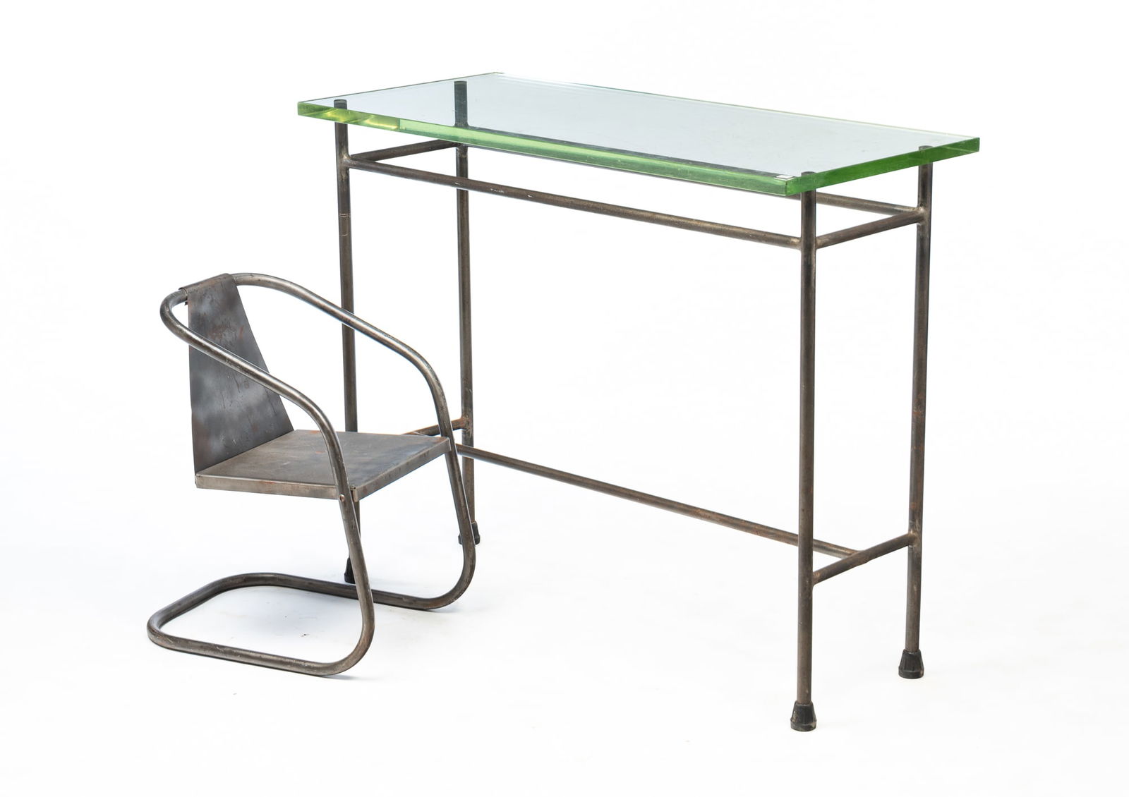 MODERNIST TUBULAR STEEL CHILD'S CHAIR AND GLASS TOP CONSOLE TABLE. (1 of 4)