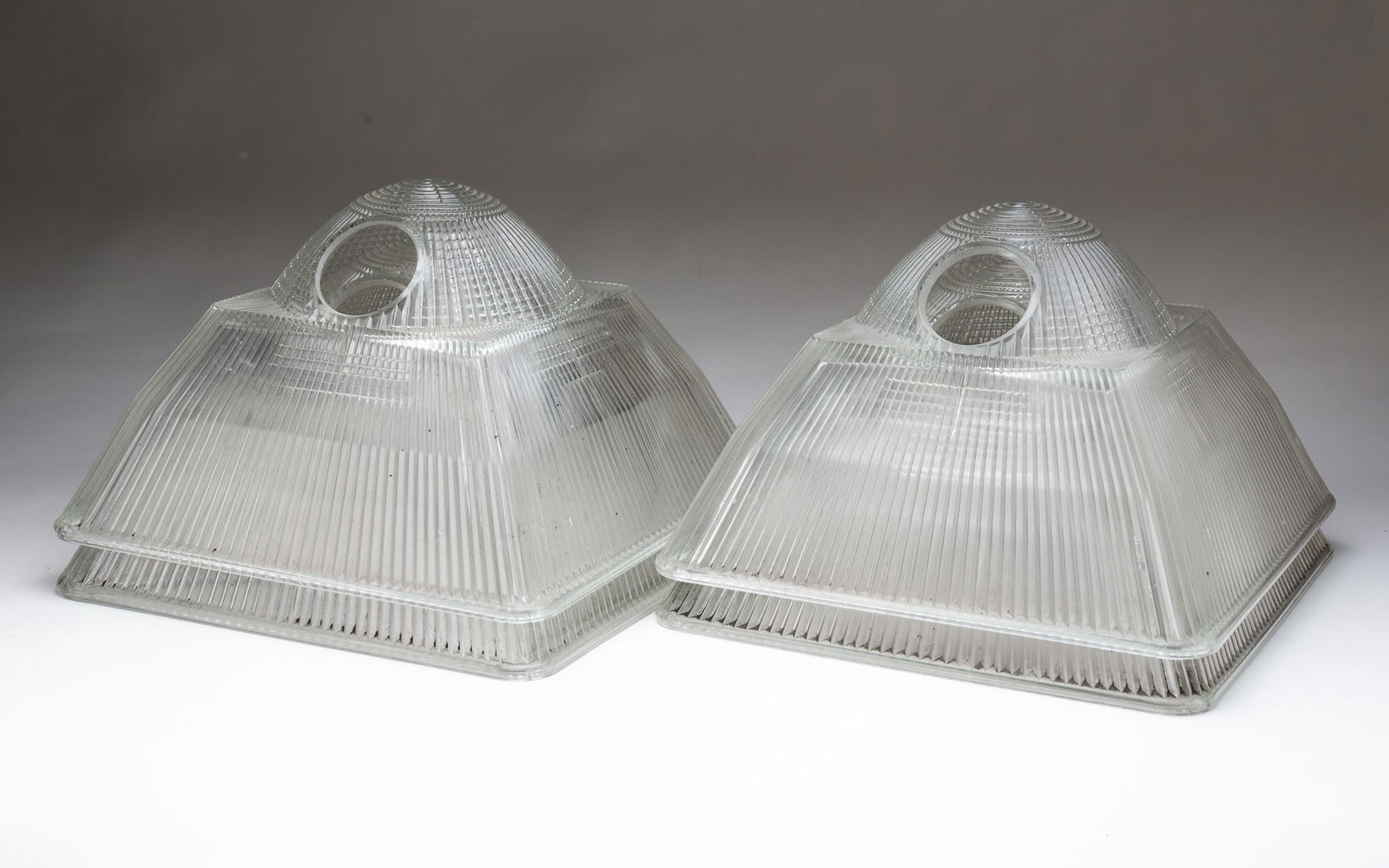 FOUR LARGE INDUSTRIAL HOLOPHANE GLASS SHADES. (1 of 3)