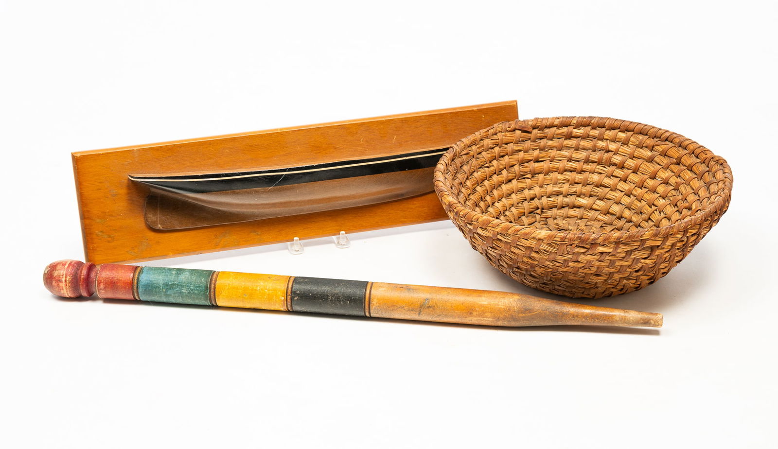 THREE AMERICAN FOLK ART ITEMS, INCL. HALF-HULL SHIP MODEL, RYE BASKET, AND CROQUET STAKE. (1 of 4)