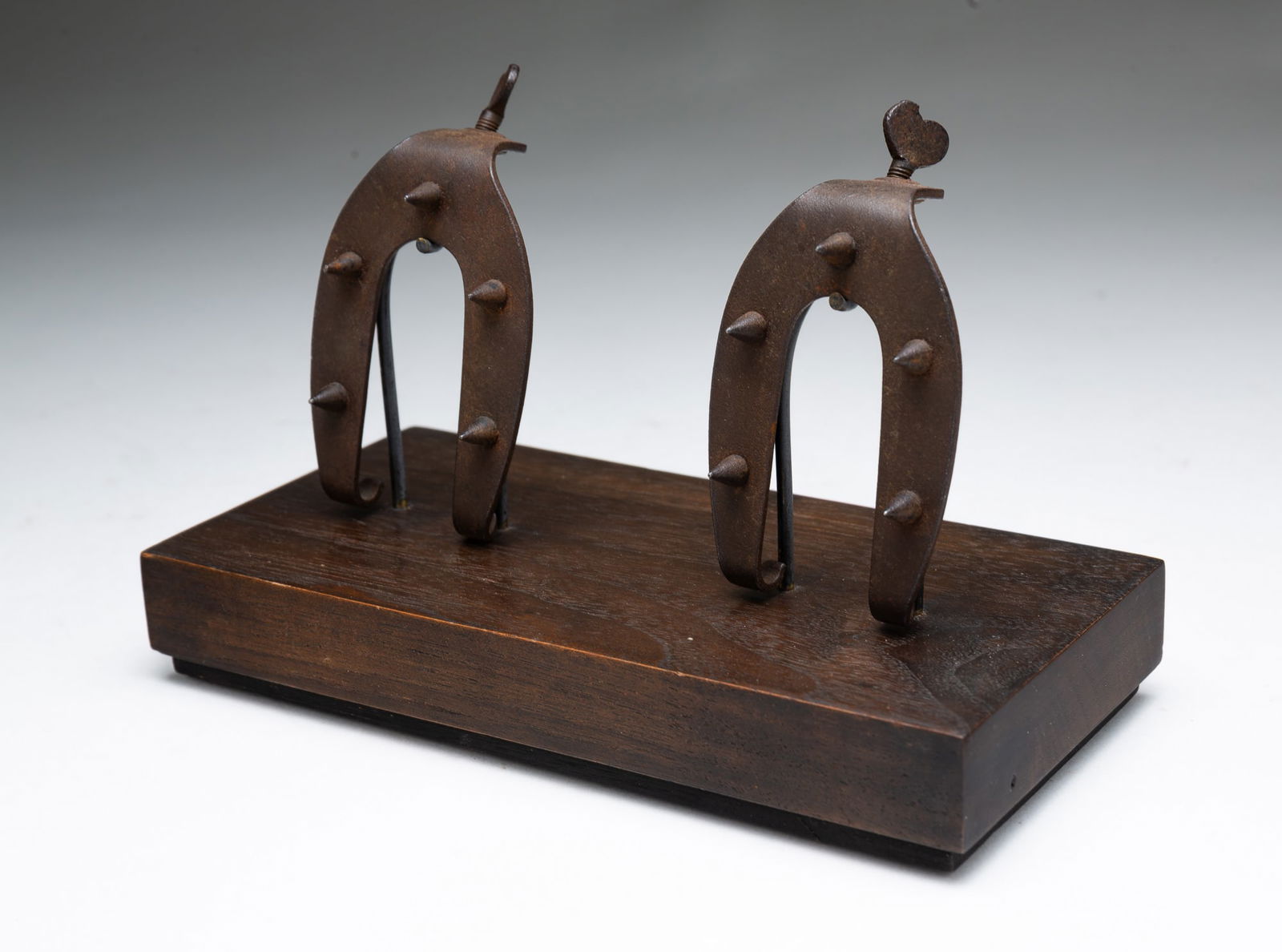 AMERICAN FORGED IRON LADIES HEEL CLEATS. (1 of 3)