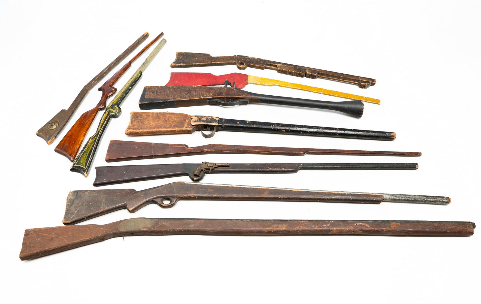 ELEVEN WOOD TRAINING AND TOY RIFLES. (1 of 6)