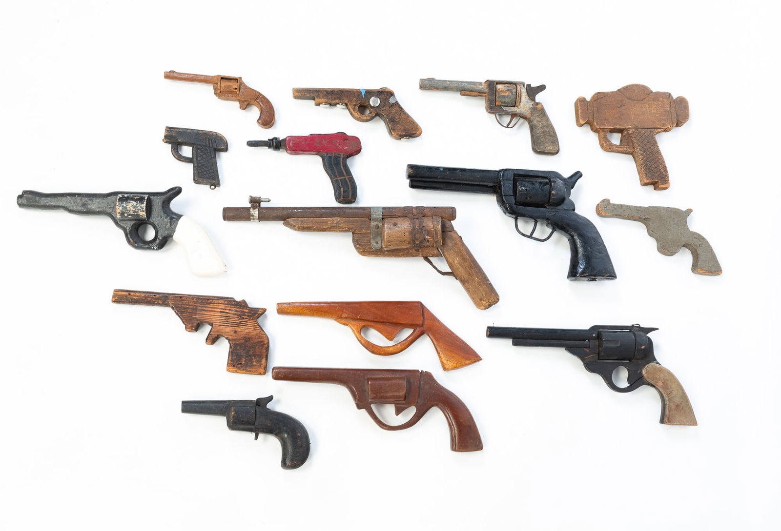 FIFTEEN WOOD TOY HANDGUNS. (1 of 4)