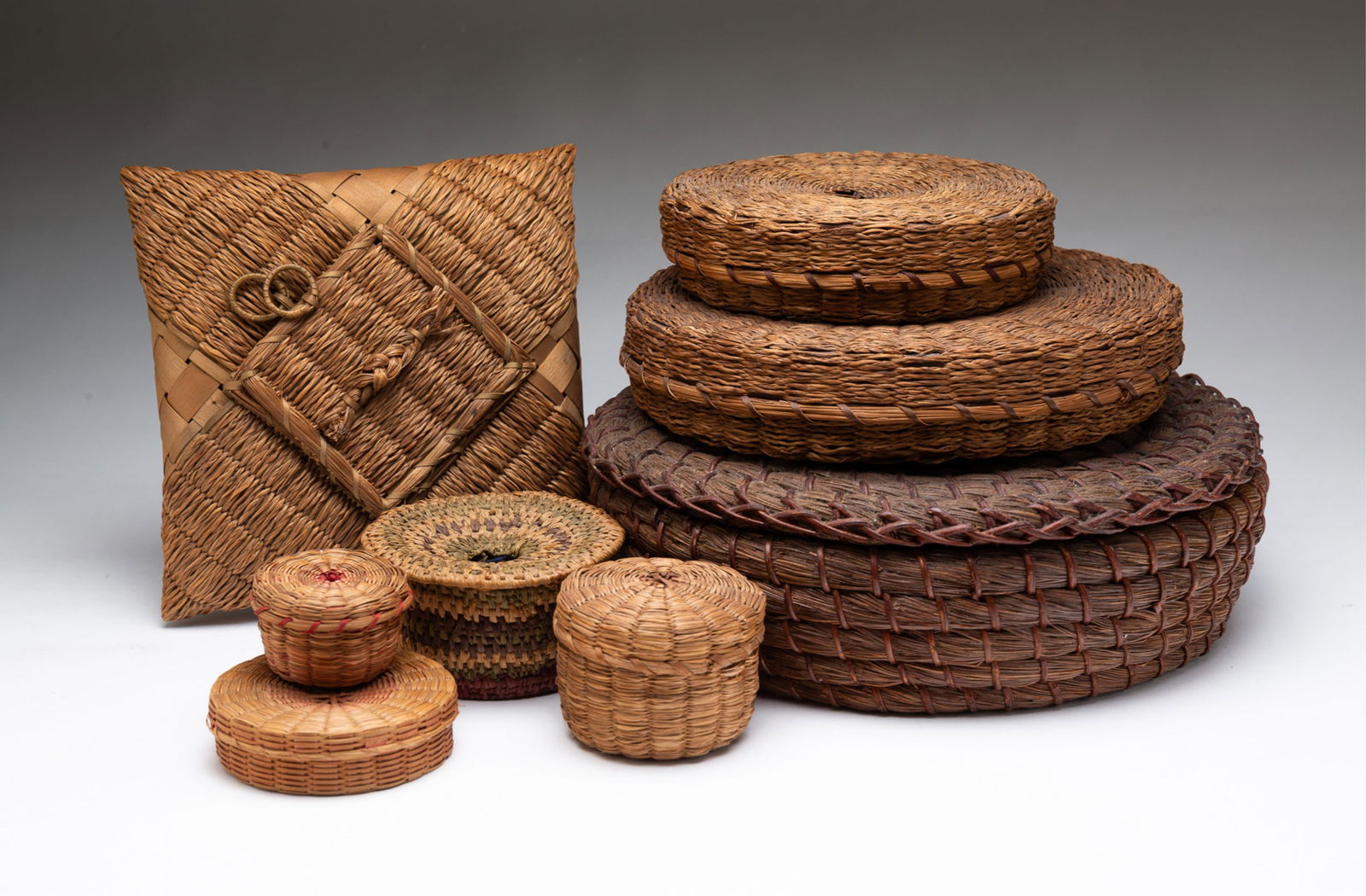 EIGHT NATIVE AMERICAN SEWING BASKETS. (1 of 6)
