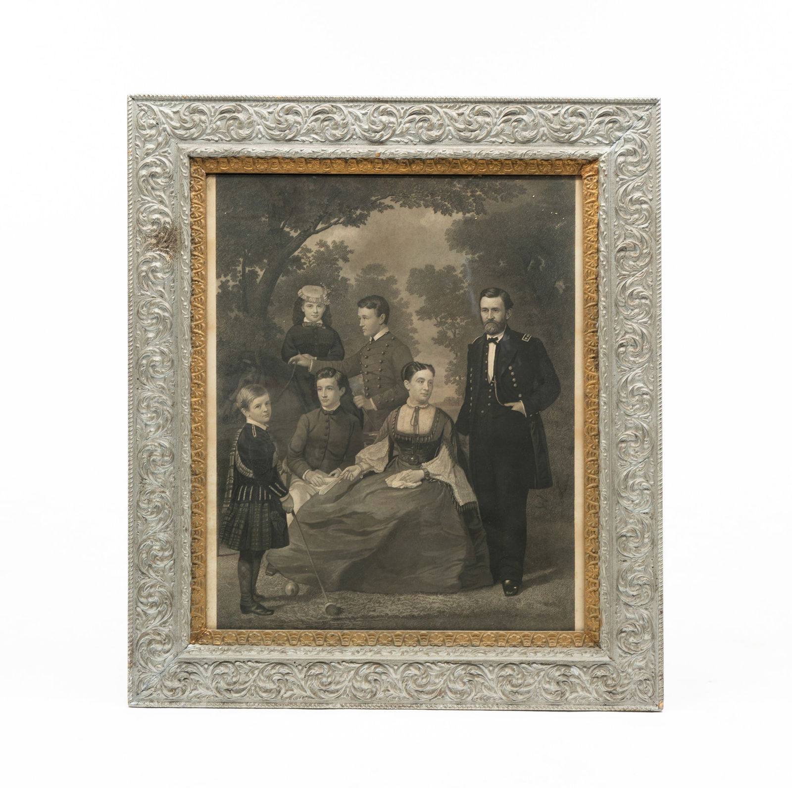 AFTER WILLIAM F. COGSWELL (AMERICAN, 1819-1903) "GENERAL GRANT AND HIS FAMILY" LITHOGRAPH.: Mid-19th Century. On paper. Based on a painting by William F. Cogswell and depicting Grant and his family with a tree-filled background. 23.75"h. 19.5"w. In an ornate frame behind glass. Frame 31.75"h