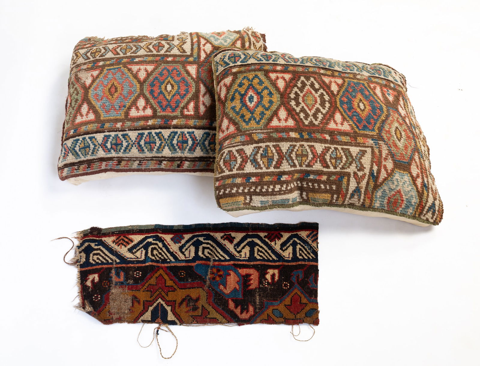 THREE CAUCASIAN RUG TEXTILES. (1 of 4)
