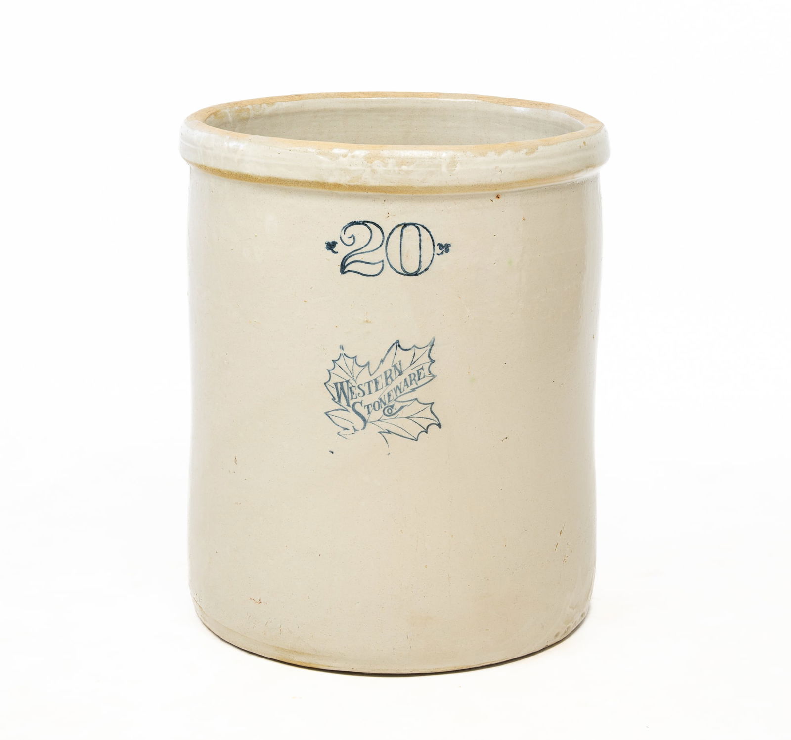 WESTERN STONEWARE TWENTY-GALLON CROCK.: American, 20th Century. Large cylindrical jar with pronounced lip, cobalt leaf with logo, and "20".Provenance: From the Lifetime Collection of Chuck Auerbach. 22"h. 18"d.