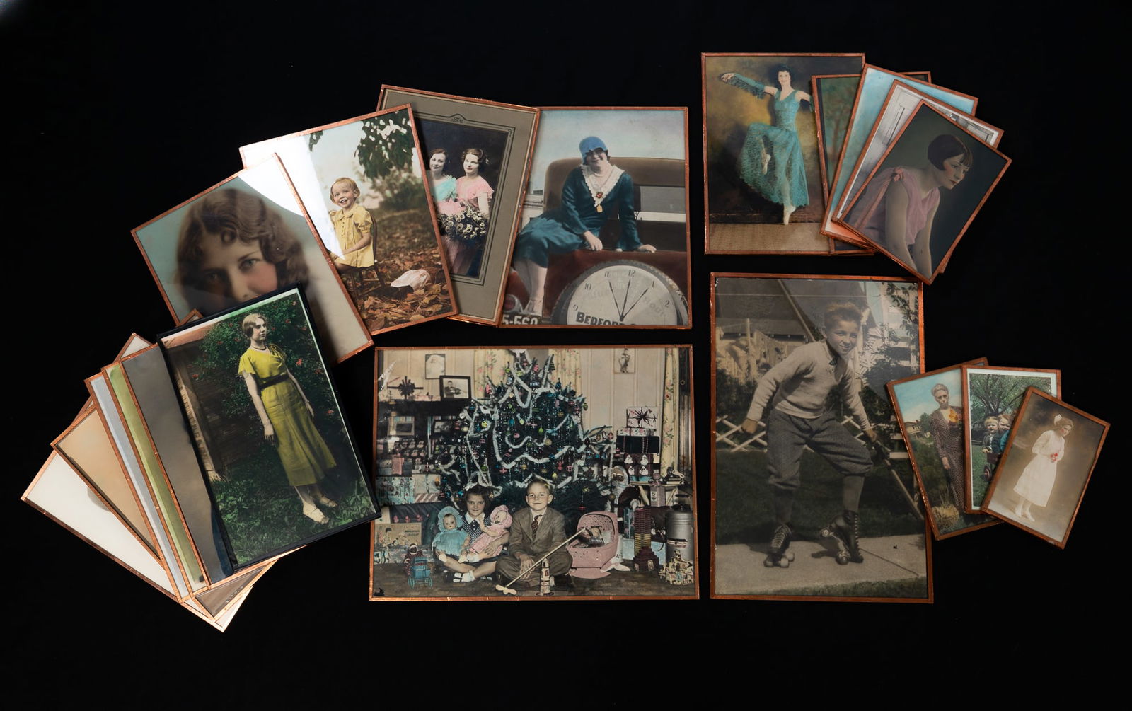 COLLECTION OF TWENTY HAND-COLORED PHOTOGRAPHS OF WOMEN AND CHILDREN. (1 of 6)