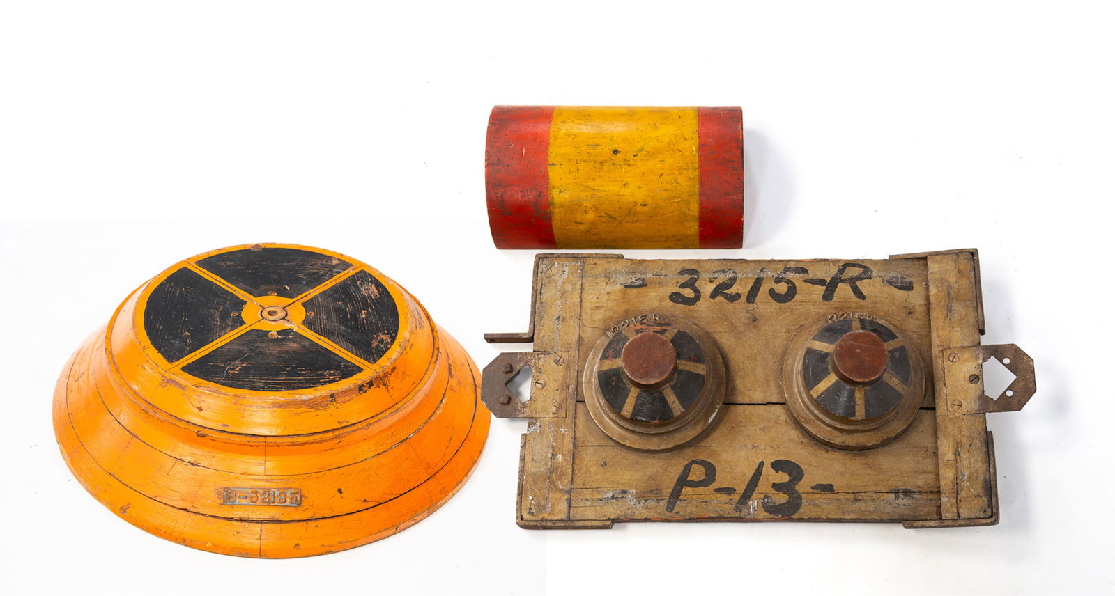 THREE AMERICAN INDUSTRIAL PAINTED FOUNDRY MOLDS.: Early 20th Century. One with round bottom, tapered sides, hole to the center, and top painted in multiple sections. With a metal tag that reads "B-58185". One half-round piece in red and yellow with t