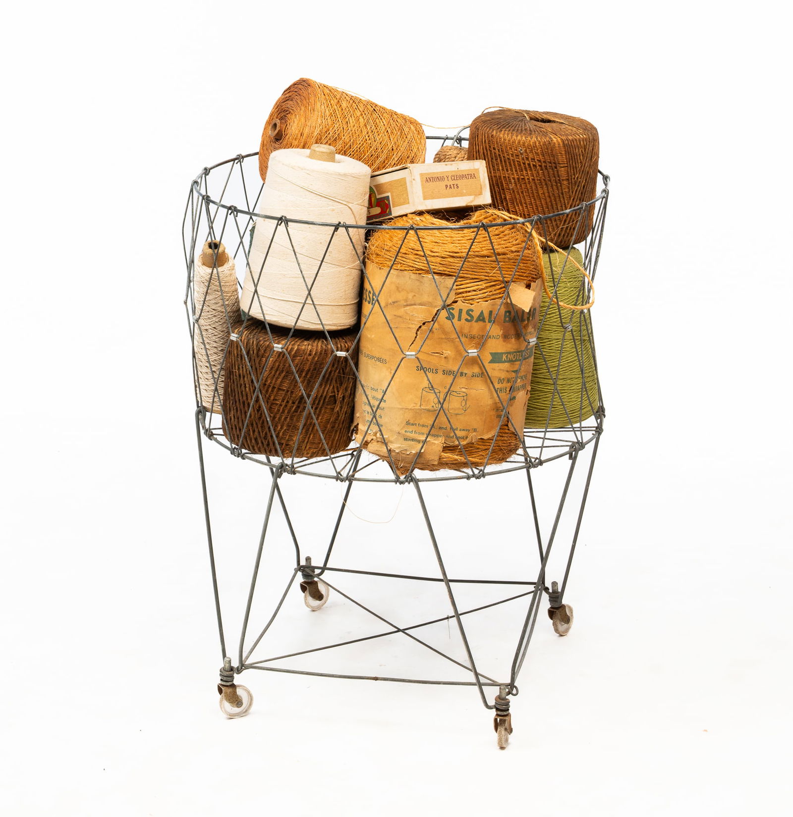 METAL LAUNDRY CART FILLED WITH STRING. (1 of 5)