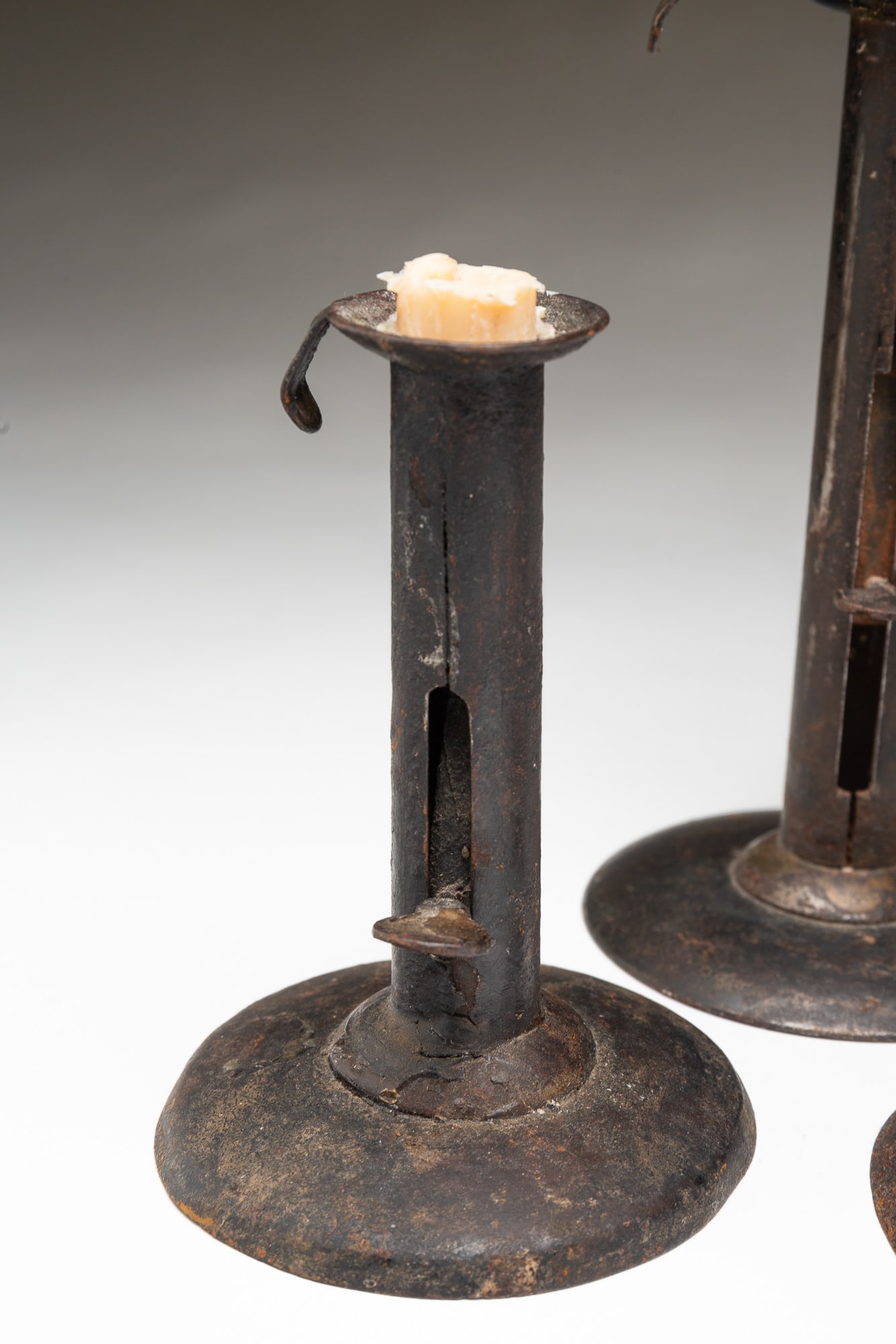 NINE HOGSCRAPER CANDLESTICKS. - 4