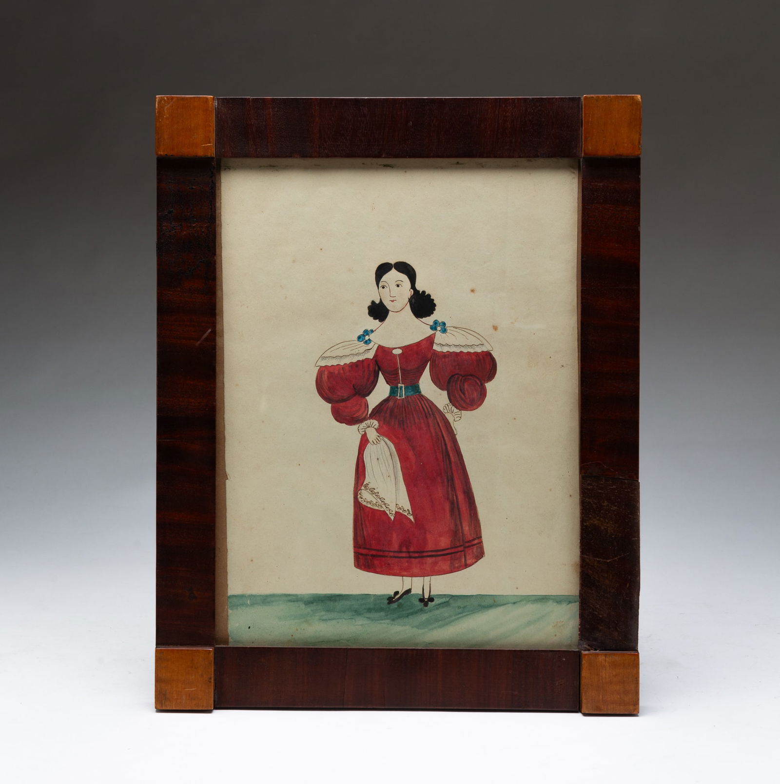 AMERICAN SCHOOL FOLK ART WATERCOLOR PORTRAIT OF A LADY WEARING A RED DRESS. 13.75"h. 10.75"w.: First half 19th Century. Rag paper. Depicting a full-length portrait of a lady with black hair, wearing a dress with puffy sleeves, lace shoulder covers, cuffs, and holds a lace handkerchief. In penci