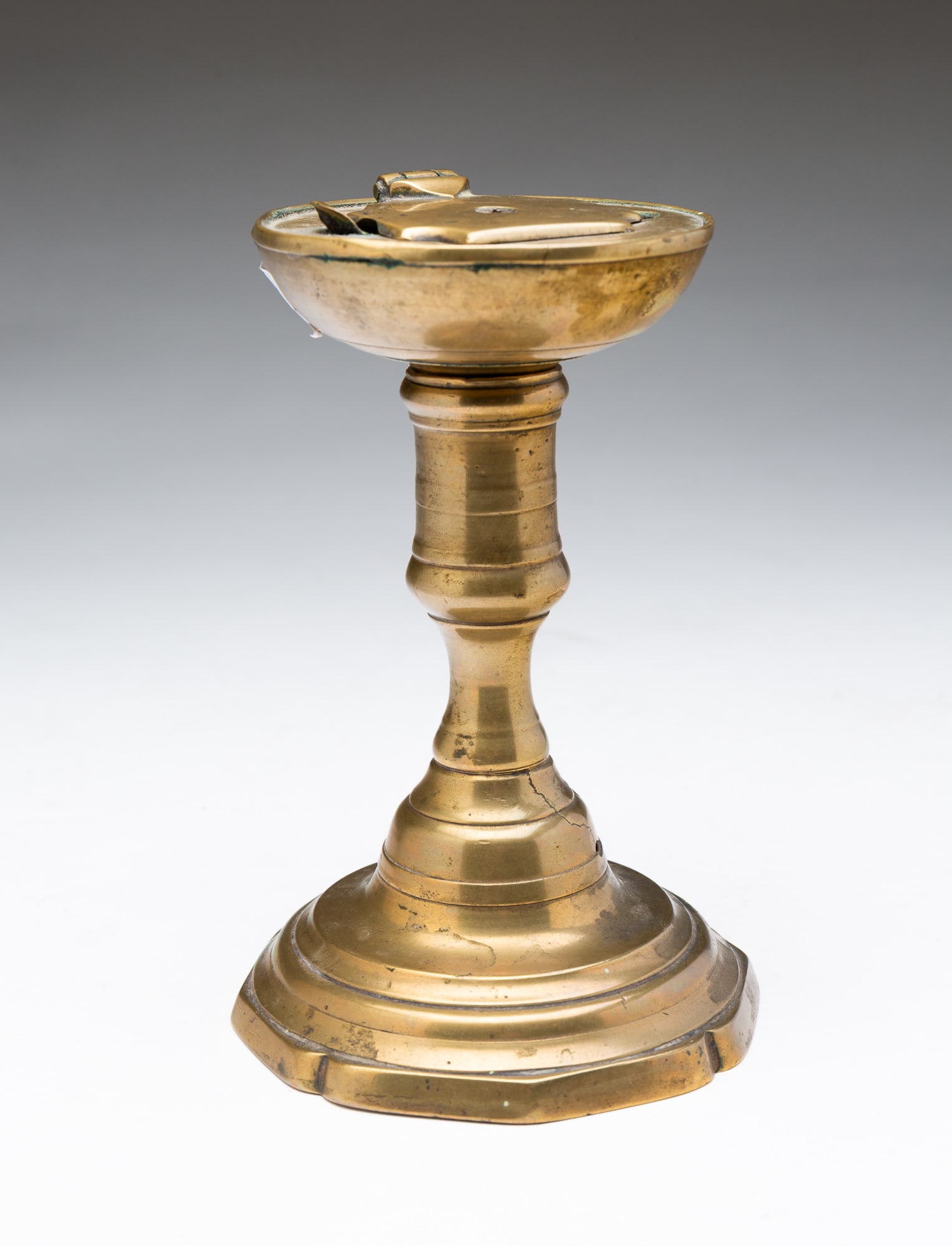 UNUSUAL EUROPEAN BRASS PEG LAMP AND CANDLESTICK. 6"h. 4"d. (1 of 4)