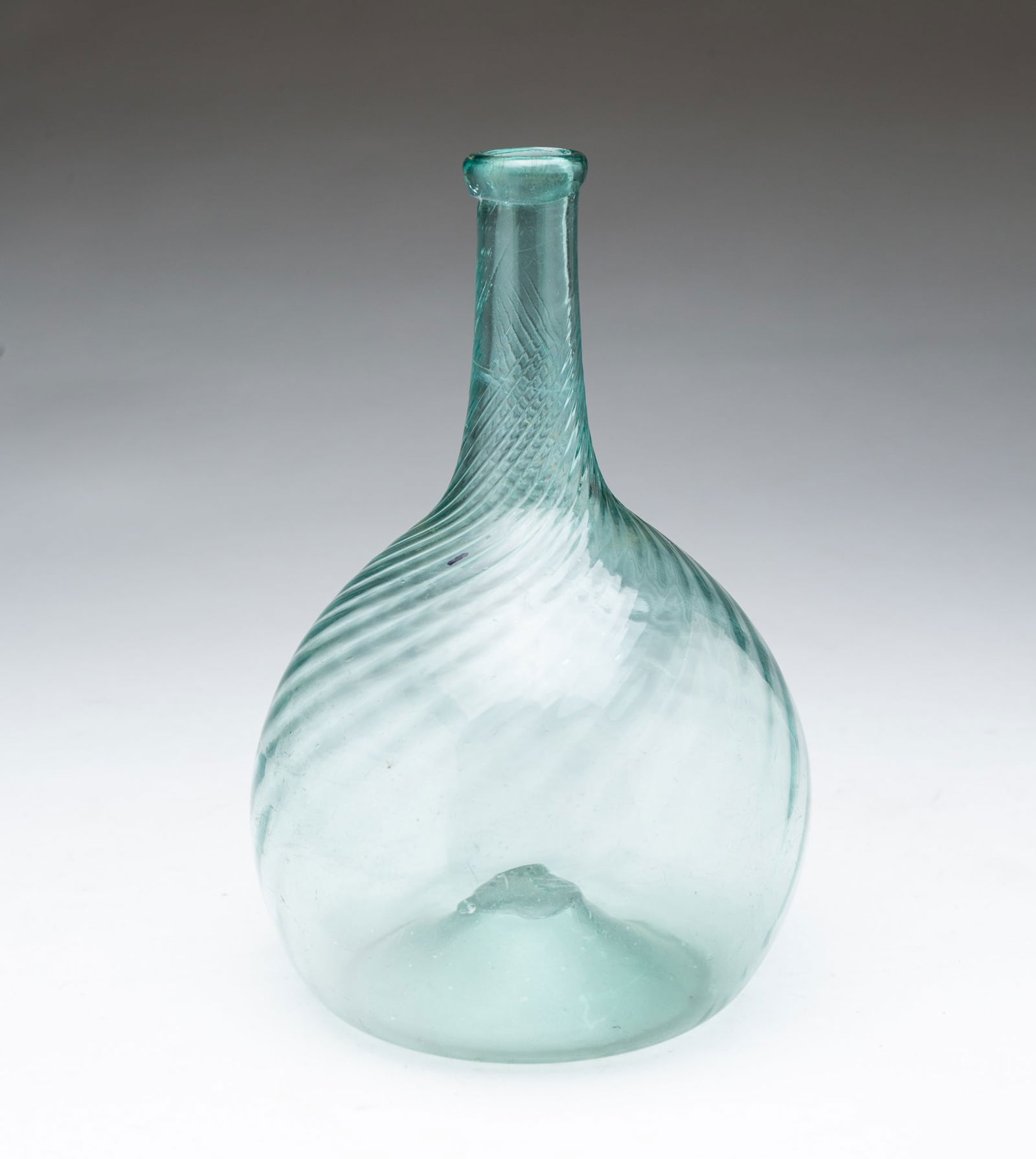 ZANESVILLE SWIRLED AQUA GLASS BOTTLE. 7.75"h. (1 of 4)