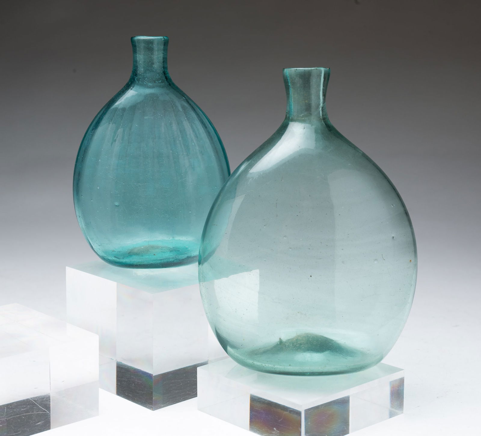 TWO AMERICAN AQUA GLASS PITKIN FLASKS. Largest, 6.25''h. (1 of 3)