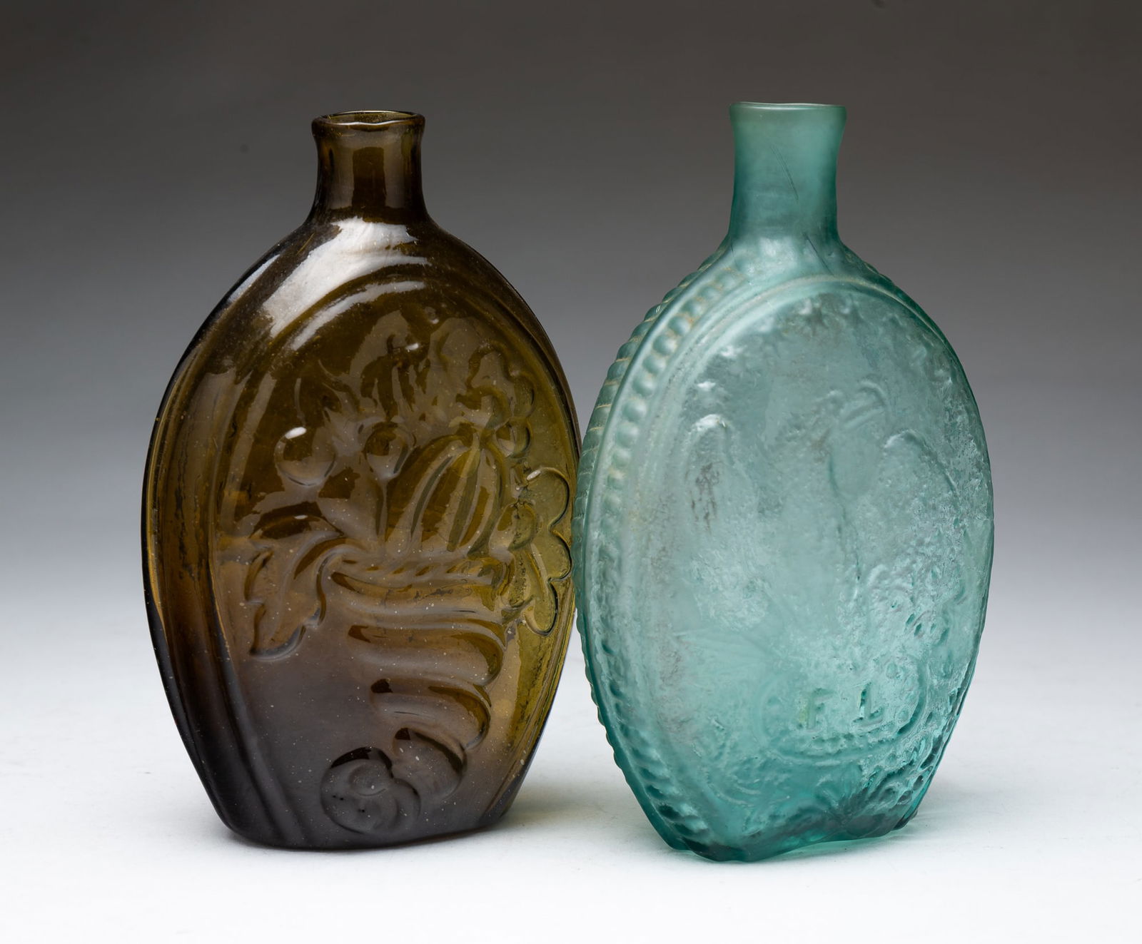 TWO AMERICAN BLOWN GLASS FLASKS. Largest, 7"h. (1 of 4)
