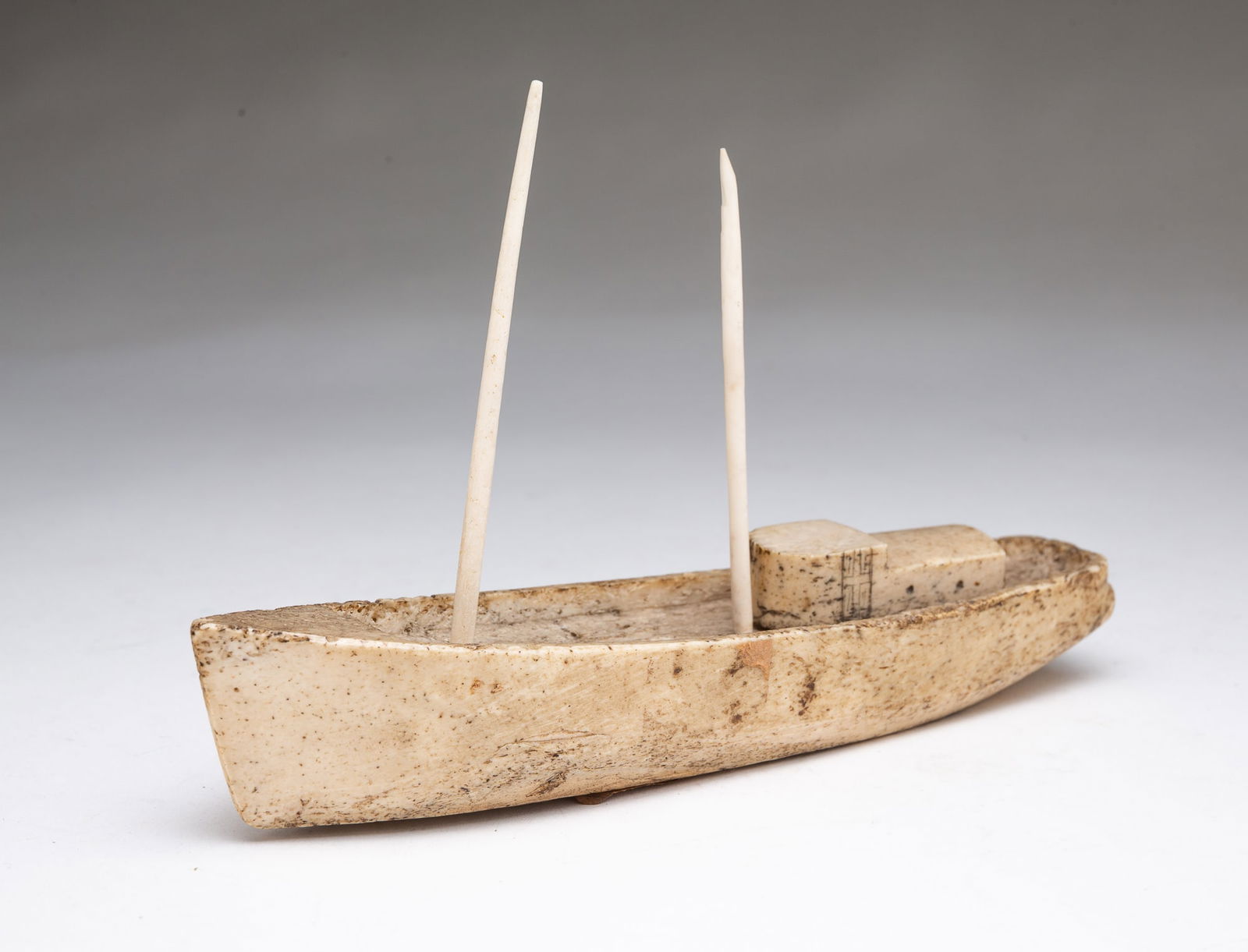 NEW ENGLAND FOLK ART SCRIMSHAW MODEL OF AN EARLY TRAWLING SHIP. Approximately 7.25"l. (1 of 4)