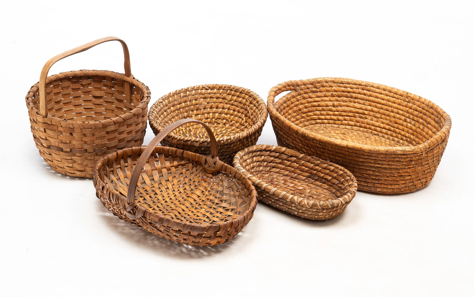 FIVE AMERICAN WOVEN BASKETS. Largest, 6.5''h. 20"W. 14.5"d. (1 of 5)