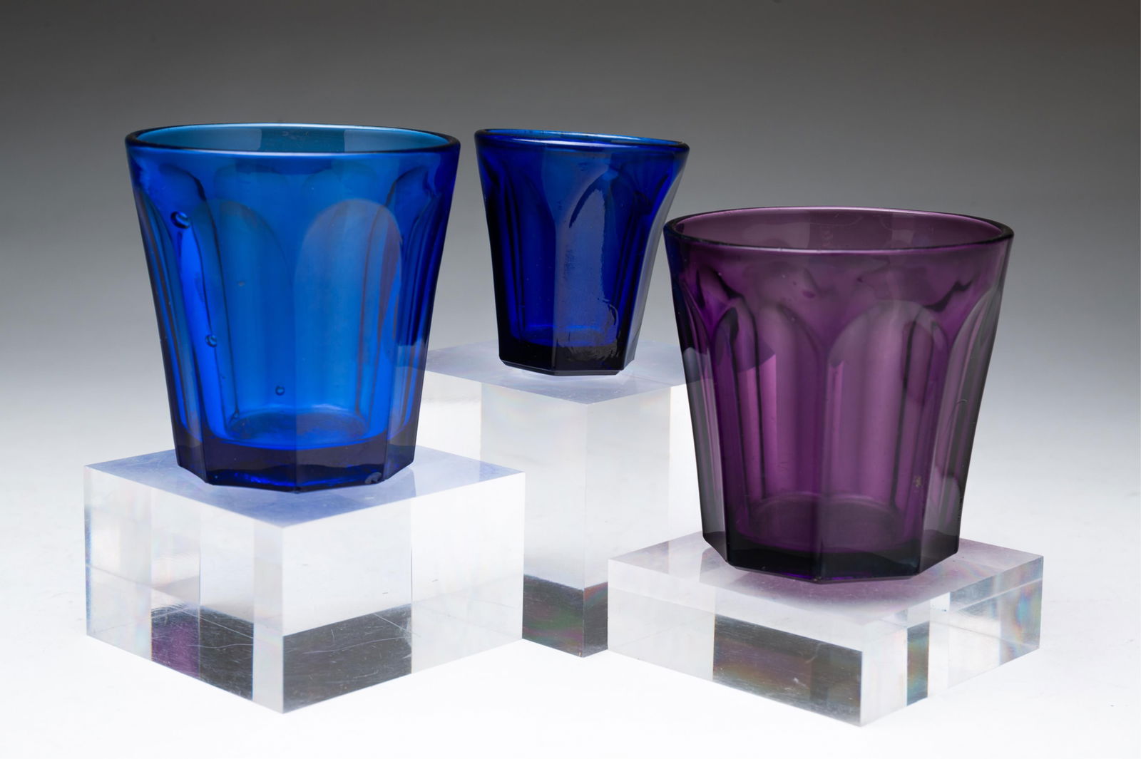 THREE PITTSBURGH COLORED FLINT GLASS TUMBLERS. Amethyst, 3.25"h. 3.25"d. Cobalt, 3.25"h. 3"d. (1 of 2)