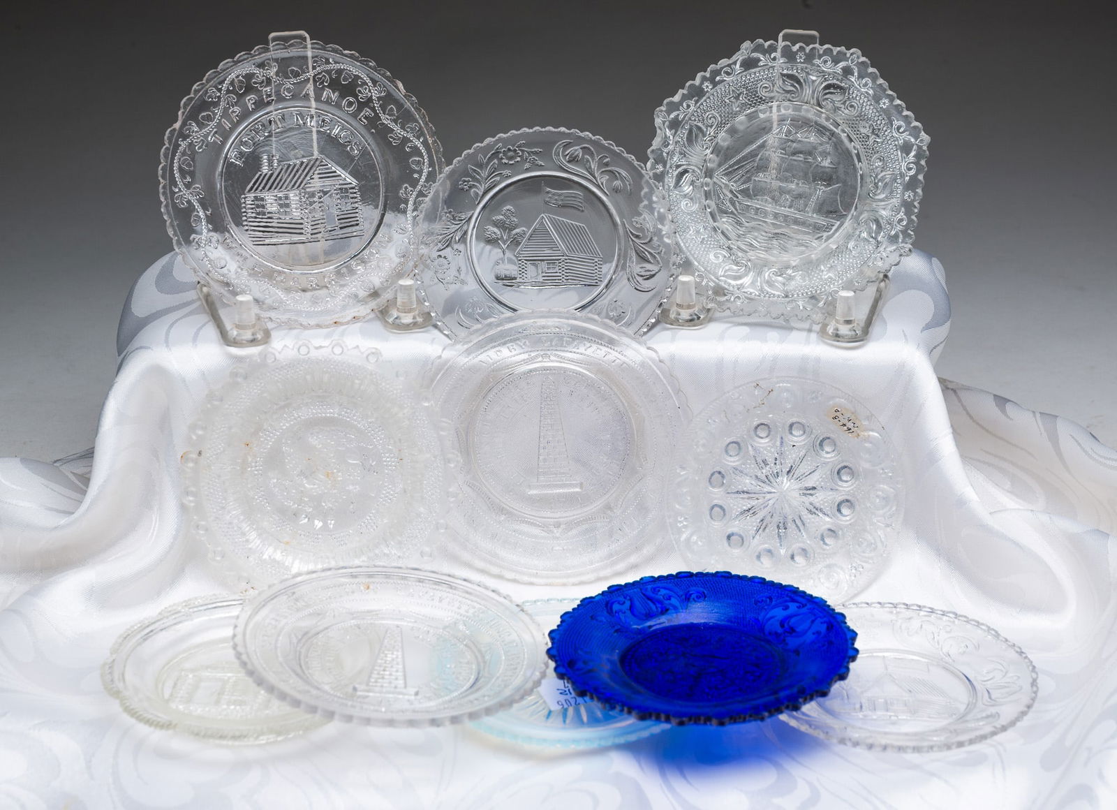 TWELVE AMERICAN FLINT GLASS CUP PLATES. Largest, 3.5"d. Smallest, 3"d. (1 of 7)
